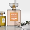 Chanel Luxury Perfume Collection Showcasing Coco Mademoiselle N°5 Bottles With Elegant Rose Accents