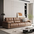 Modern Leather Three Seater Sofa In Minimal Living Room With Floor Lamp And Green Plant
