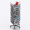 Functional Magazine Rack With Multiple Shelves Holding Various Magazines On Wheels 3d model
