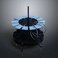 Mechanical Device Model With Blue Fan Blades Black Central Rod Metal Rings And Support Legs