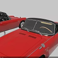Two Classic Red Convertible Cars With Vintage Exterior Design And Open Tops