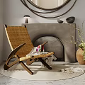 Woven Rattan Leisure Chair By Fireplace With Circular Mirror And Potted Plant