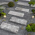 Zen Garden Path With Stone Slabs Pebble Ground Small Shrubs And Lamps