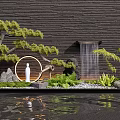 Garden Ornamental Scene With Pine Tree Circular Ornament White Statue Waterfall Pebbles And Water Reflection