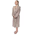 A Woman Wearing Light Brown Hooded Robe With Belt Standing Barefoot