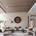 Stylish Lounge Area Featuring Comfortable Sofa Coffee Tables Floor Lamp Circular Wall Art And Plants