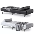 Modern Black Leather Chaise Lounge With Metal Legs Rolled Cushion And Gray Throw Blanket
