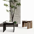Modern Black And Wooden Stools With Green Plant Near Stone Wall Background