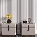 Light Gray Bedside Tables With Leather Handles Yellow Flowers Camera And Lamp On Striped Wallpaper