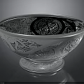Intricate Sculpture Carving On Silver Bowl With Pedestal Base And Detailed Patterns