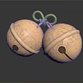 Golden Bells With Curved Patterns Tied By Green Rope On Dark Background