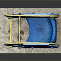 Colorful Fish Shaped Playground Equipment with Yellow Blue Body and Red Spring On Concrete Base