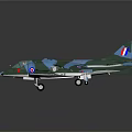 Military Aircraft Model With Blue Green Camouflage British Roundel On Tail And Weapons Under Wings