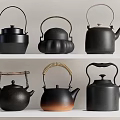 Collection of Six Black Tea Kettles with Various Designs and Different Handles Including Gradient Color