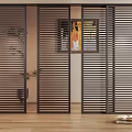 Modern Interior Featuring Dark Louvered Doors As Partition With Wood Floor Potted Plant And Art