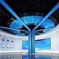 Modern Exhibition Space with White Geometric Walls Display Stand Screens Globe and Blue Lighting