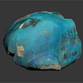 Blue Artisan Sculpture Carving With Textured Surface And Weathered Details