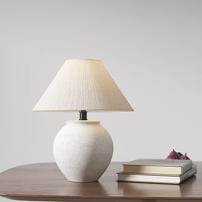 Ceramic Table Lamp with Textured Beige Lampshade Near Stacked Books and Figs on Table 3d model