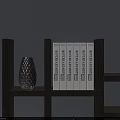 Six Vertical Books Arrangement With Hollow Design Vase on Gray Background