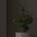 Elegant Vase Floral Arrangement with Green Ribbons White Small Flowers Pine Needles and Brown Vase