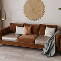 Brown Three Seater Sofa With White And Brown Cushions On Wooden Floor And Circular Decor