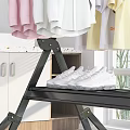 Black Foldable Clothes Drying Rack with Wheels Hanging Shirts and Lower Shelf Holding Shoes Pillow