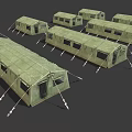 Multiple Green Military Tents In Canvas Material With Ropes And Frames