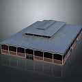 Brick Walled Building With Metal Roof Arched Windows Central Raised Roof Section And Symmetrical Design