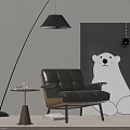 Black Leather Leisure Chair With Floor Lamp Side Table Polar Bear Painting And Gray Carpet