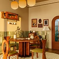 Cozy Restaurant Interior With Round Wooden Table Chairs Green Cushions Decorative Paintings Wooden Wall Cabinet