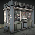 Children's World Kiosk Exterior With Magazines In Windows On Sidewalk With Trash Bin And Grass