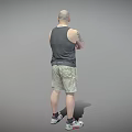 Bald Man With Beard Standing With Arms Crossed In Tank Top And Camouflage Shorts