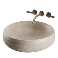 Round Light Colored Textured Stone Wash Basin With Golden Faucet And Double Handles