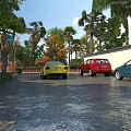 Modern Building Exterior Wall With Parked Cars And Lush Green Trees Around