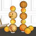 Multiple Stacked Traditional Chinese Lanterns With Decorative Patterns And Calligraphy In Modern Interior