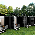 Black Container Homestay Building With Glass Doors On Green Lawn Among Trees