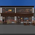 Charming Commercial Street With Red Brick Buildings Red Awnings Outdoor Seating And Wooden Deck