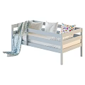 Light Blue Kids Bed With Guardrails Pillows And Soft Blanket