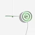 Modern Lighting Combination Featuring Flat Disc Pendant Light and Circular Wall Lamp with Concentric Patterns