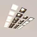 Downlights and Spotlights Neatly Arranged on Ceiling with White and Black Frames Providing Bright Illumination