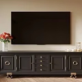 Dark Gray TV Stand With Gold Accents Vase Red Flowers And Wooden Floor