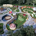Children's Play Area With Slides Swings Climbing Structures Huts And Green Paths