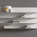 White Floating Wall Mounted Shelves With Stacked Books And Decorative Items On Gray Background