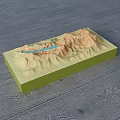Commercial Equipment 3D Terrain Model With Green Base Brown Mountains And Blue Lakes