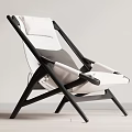 Modern Lounge Chair with Black Wooden Frame White Gray Cushions and Sleek Design