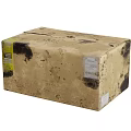 Brown Cardboard Box With Black Stains And White Labels On Soiled Surface