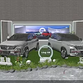 Car Exhibition Display Shelves With Wuling Victory Xingchen Ling OS Green Lawn And Plants