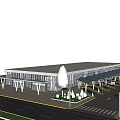 Modern Public Facility With Glass Facade Canopy Entrance Landscaped Area And Traffic Lights
