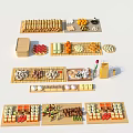 Assorted Food Items Displayed on Bamboo Trays with Fruits Pastries and Sushi