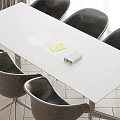 Contemporary White Conference Table With White Chairs And White Paper Yellow Sticky Note Colored Markers